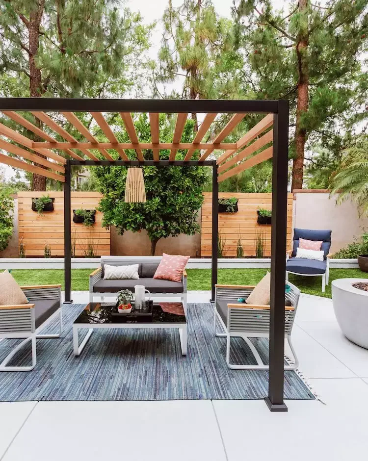 20 Stunning Modern Pergola Designs That'll Transform Your Outdoor Living Space 17 Dark and Light Wood Pergola