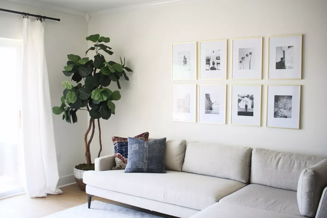 40 Stunning Minimalist Living Room Ideas That Showcase Effortless Style 32 Decorate Walls With Photos