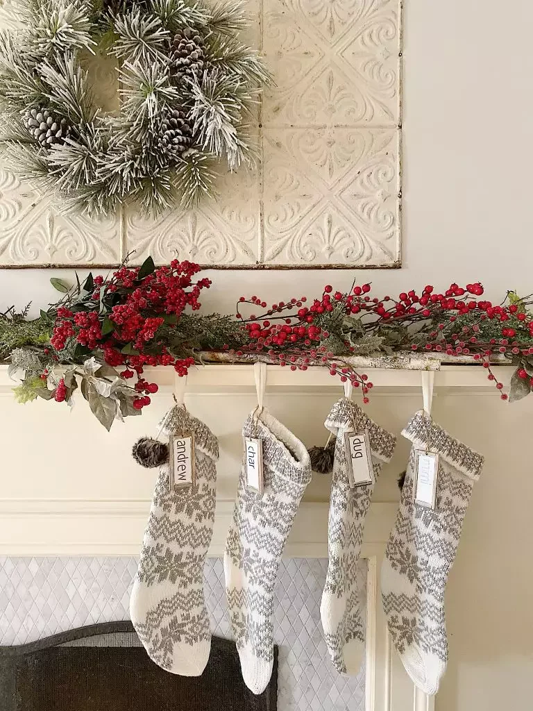 56 Magical Christmas Mantel Decorating Ideas to Transform Your Holiday Home 29 Decorate With Faux Berries