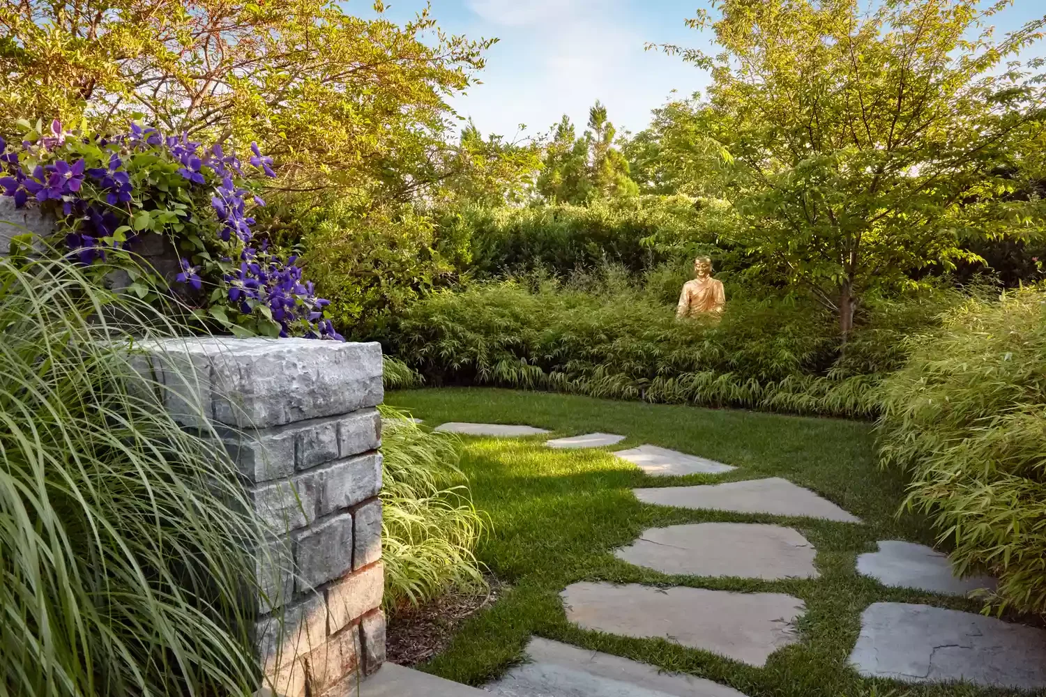 21 Tranquil Zen Garden Ideas That Will Transform Your Outdoor Space Decorate With a Buddha Sculpture