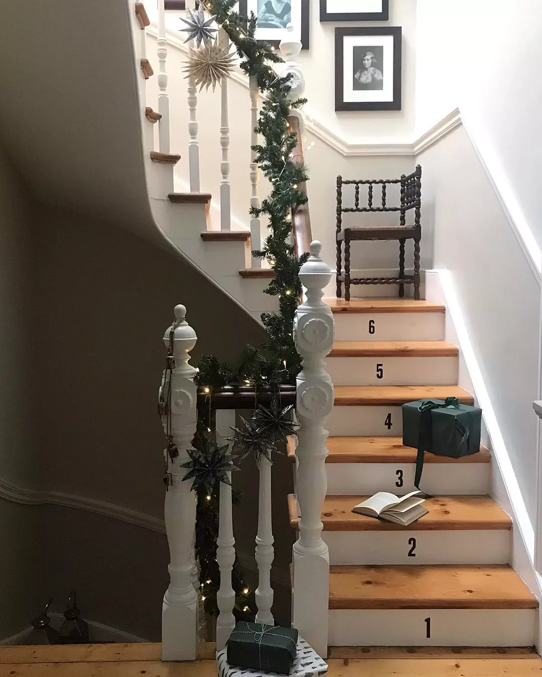 24 Creative Staircase Landing Decorating Ideas to Transform Your Space 18 Decorate With a Chair