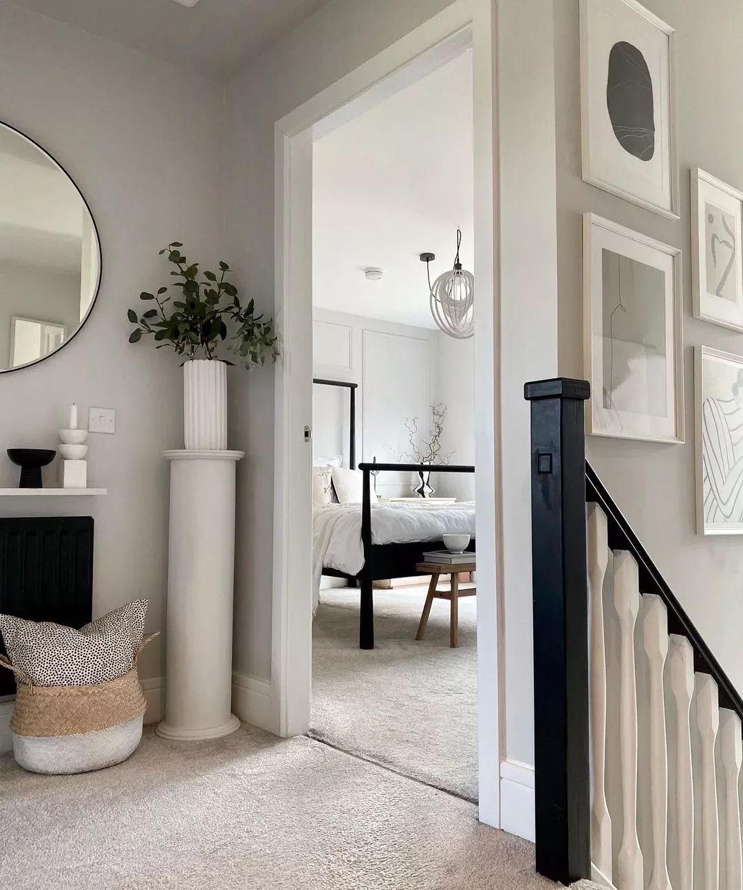 24 Creative Staircase Landing Decorating Ideas to Transform Your Space 7 Decorate With a Pedestal