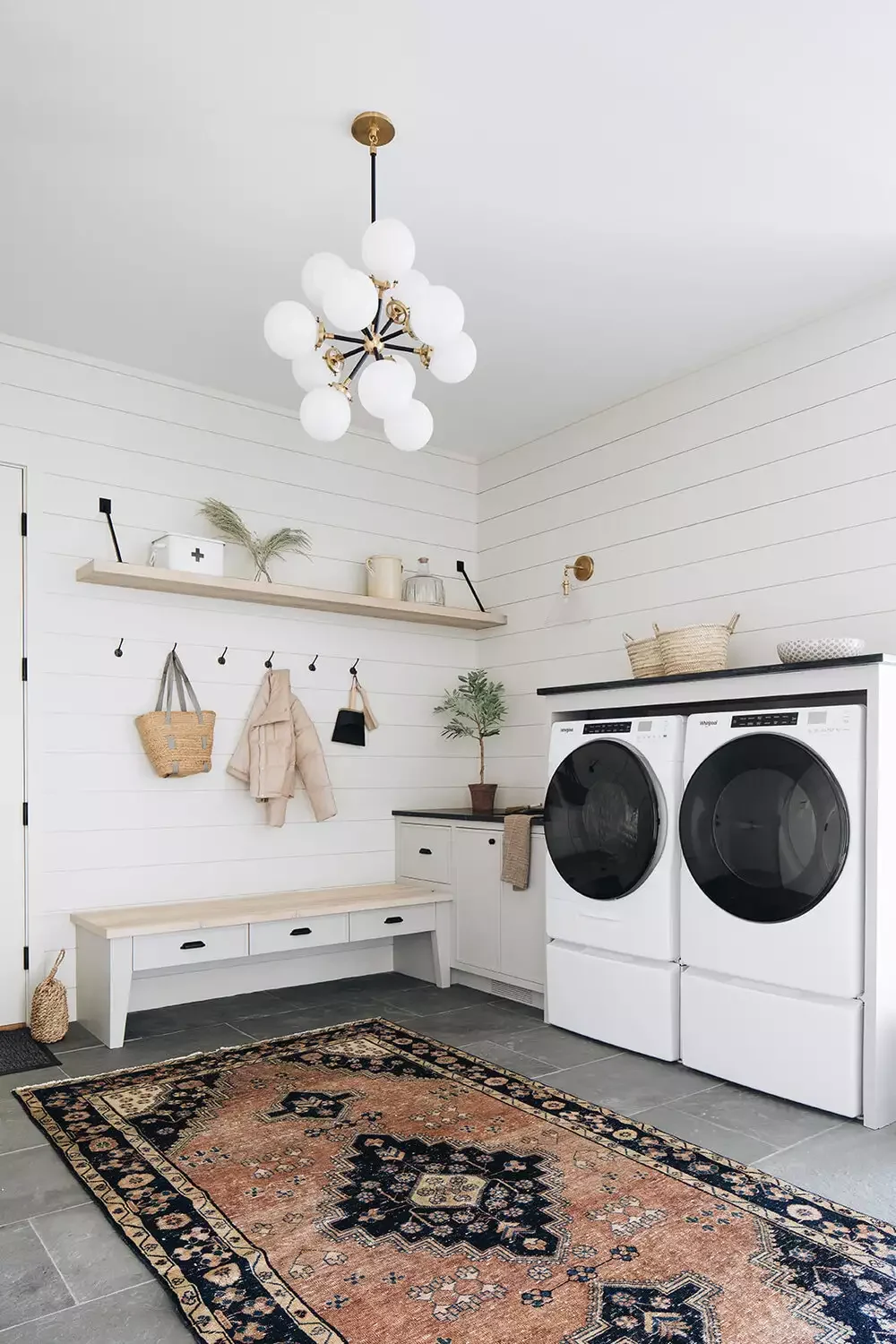 57 Creative Laundry Room Ideas That'll Make You Actually Enjoy Doing Chores Decorate With an Area Rug