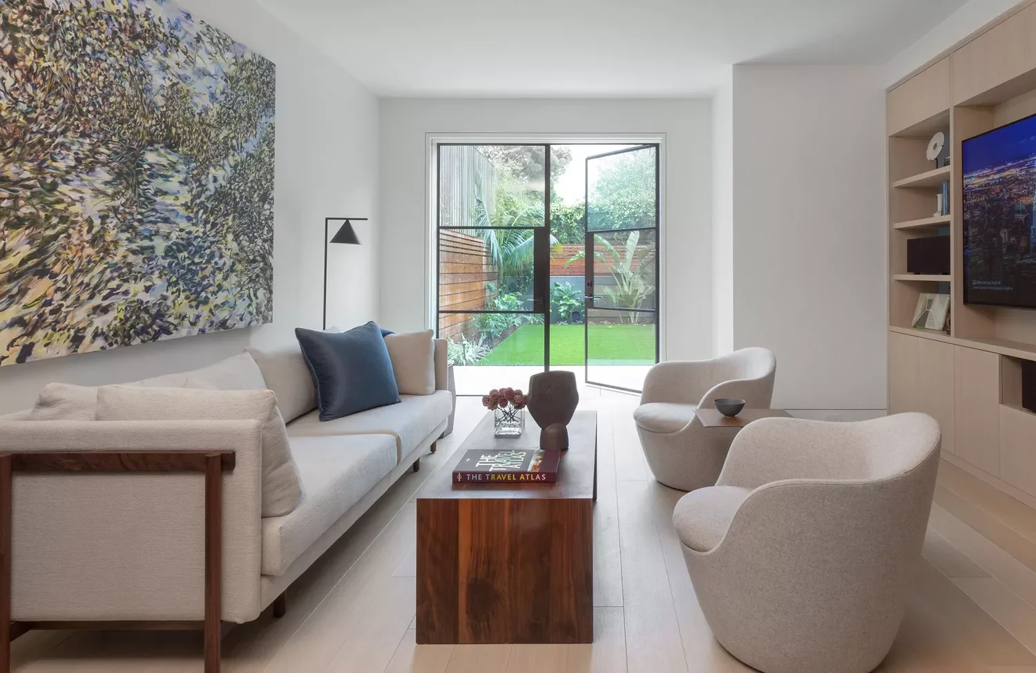 21 Brilliant Ways to Style Your Small Living Room TV Without Compromising Style 7 Decorate the Opposite Wall