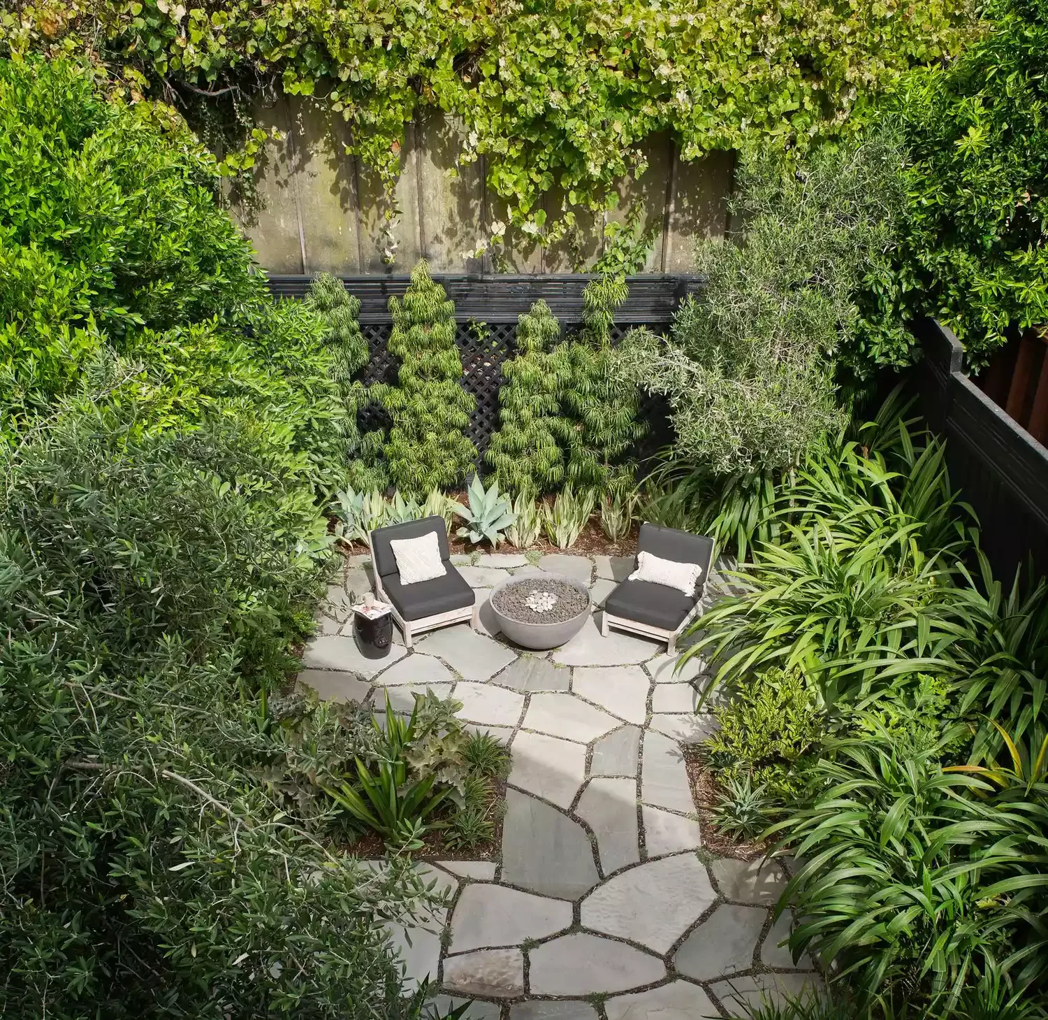 20 Stunning Grass-Free Backyard Designs That Create Lush Outdoor Retreats 14 Design a Private Oasis