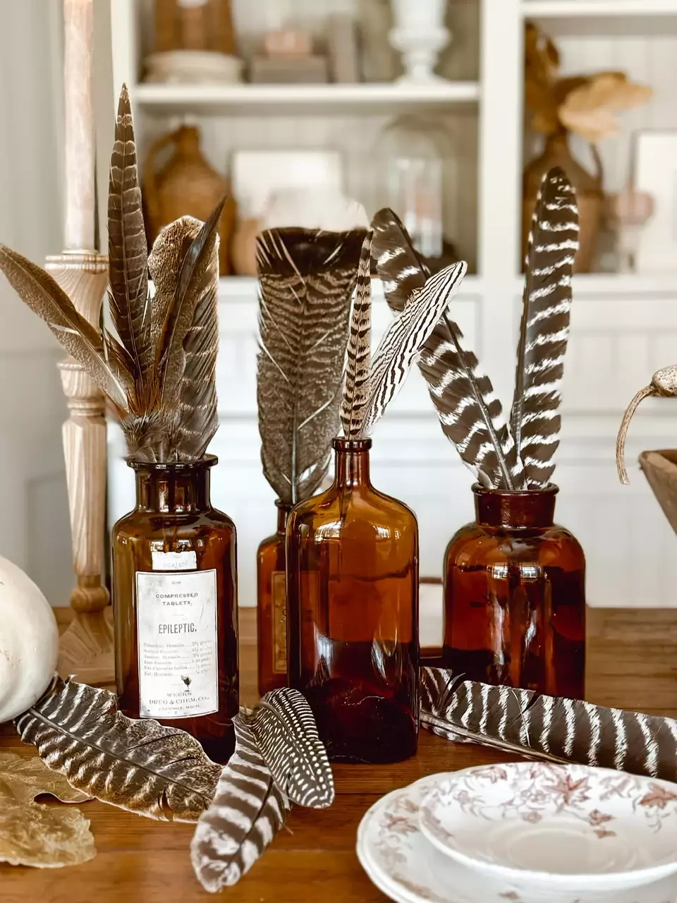 78 Beautiful Fall Table Decorating Ideas to Transform Your Seasonal Celebrations 65 Display Amber Bottles