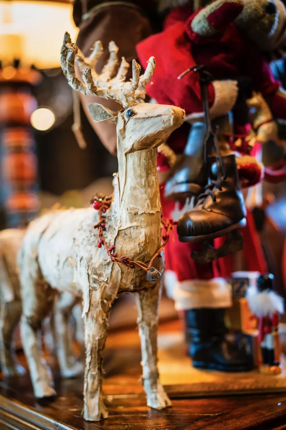 115 Stunning Christmas Decorating Ideas to Transform Your Home This Holiday Season Display a Reindeer Figurine