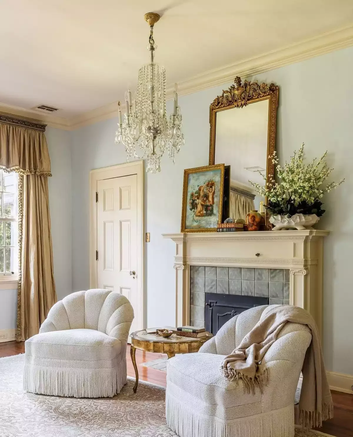 34 Classic Living Room Ideas That Never Go Out of Style Display an Antique Mirror