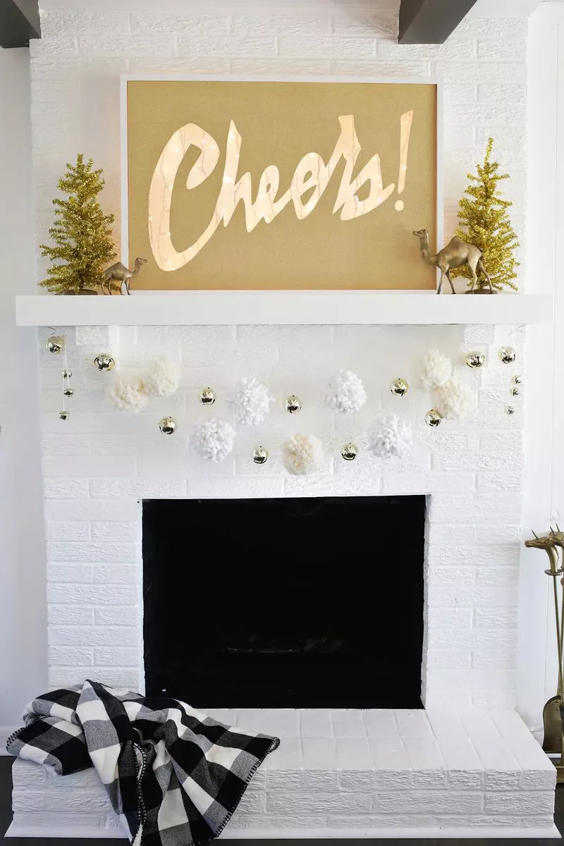 56 Magical Christmas Mantel Decorating Ideas to Transform Your Holiday Home 23 Display an Illuminated Sign