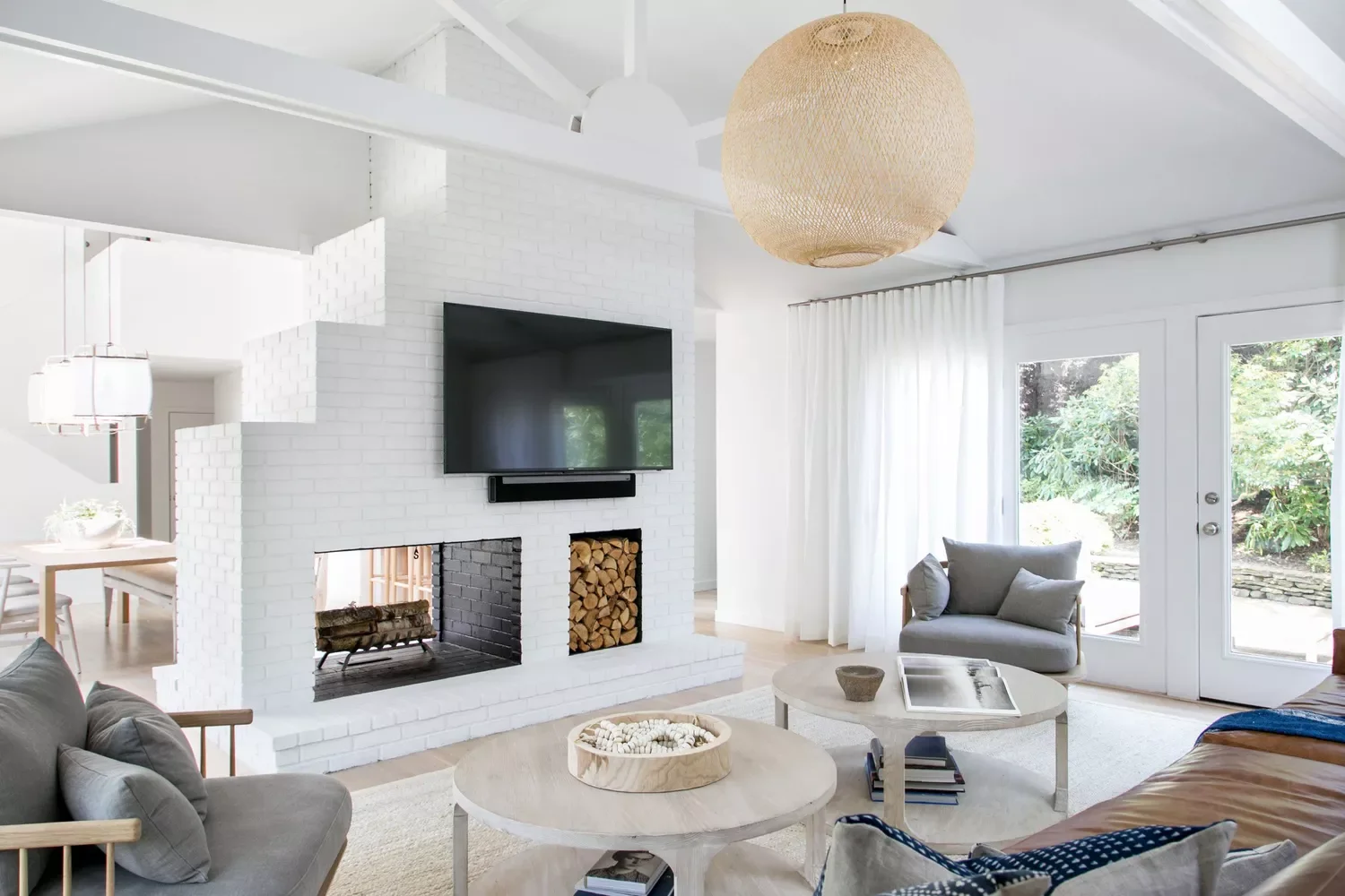 34 Stunning Painted Brick Fireplace Ideas to Transform Your Space 17 Double-Sided Fireplace