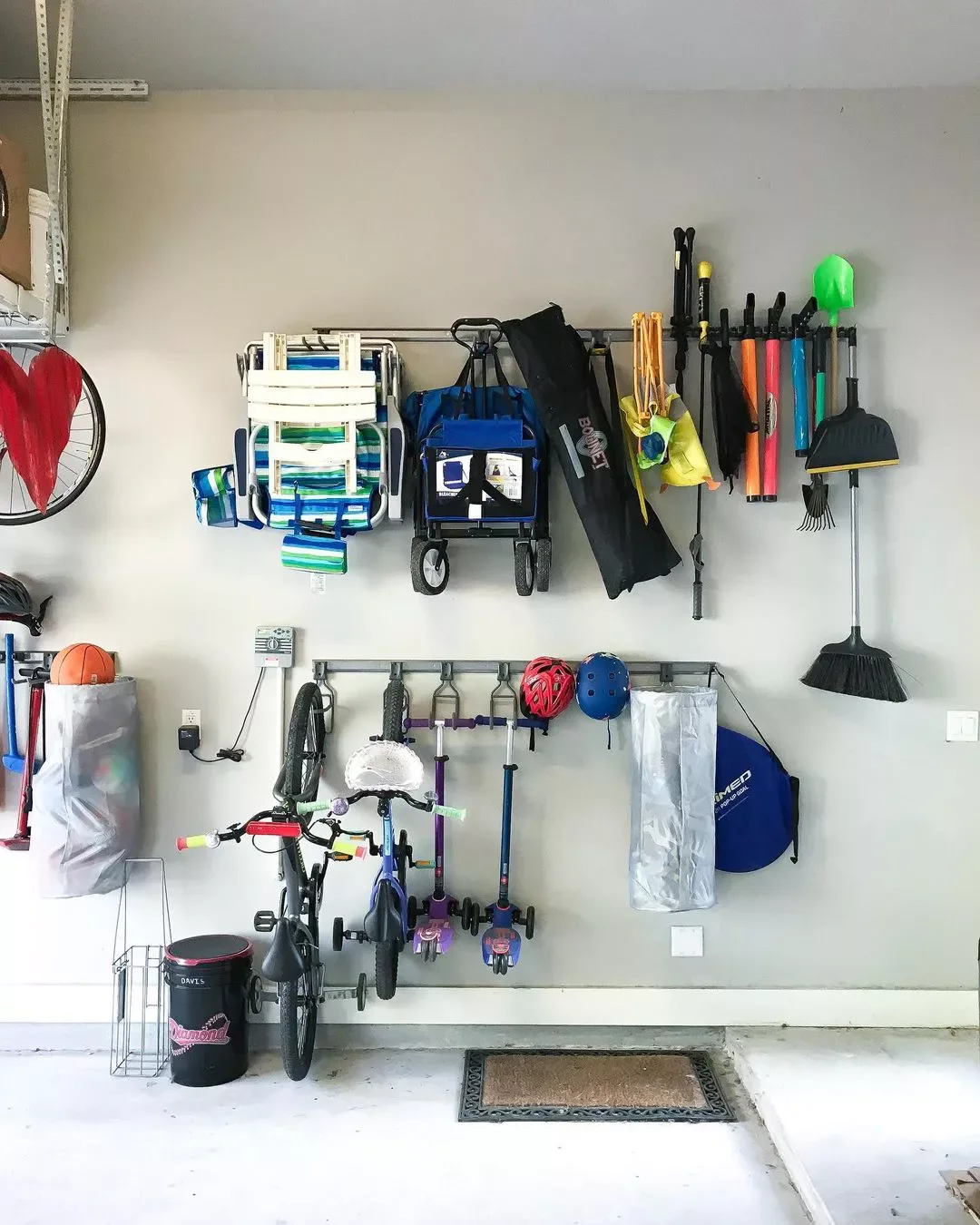 20 Clever Ways to Store Your Mops and Brooms Like a Pro Double Up Your Wall Hooks