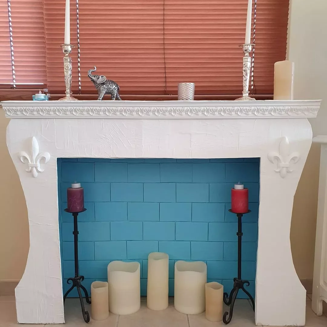 24 Creative Ways to Transform Your Fireplace with Candles 13 Drop It Low