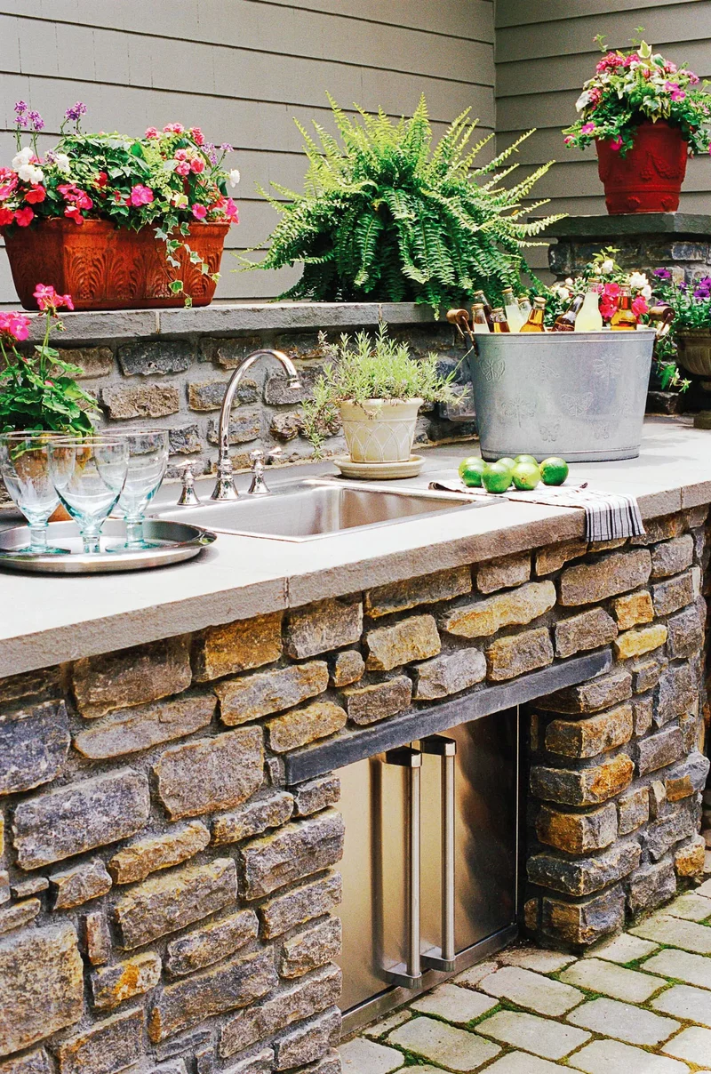 32 Stunning Outdoor Kitchen Ideas Perfect for Entertaining 2 Durable Stone Structure