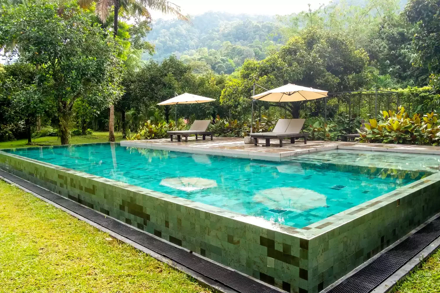 20 Stunning Above-Ground Pool Landscaping Ideas to Transform Your Backyard 7 Echo the Landscape