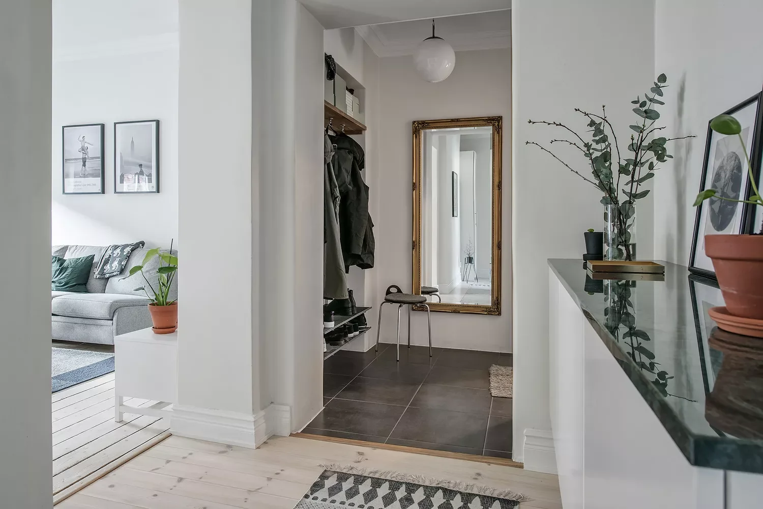 22 Breathtaking Entryway Designs That Create Stunning First Impressions 10 Efficient Entryway in a Swedish Apartment