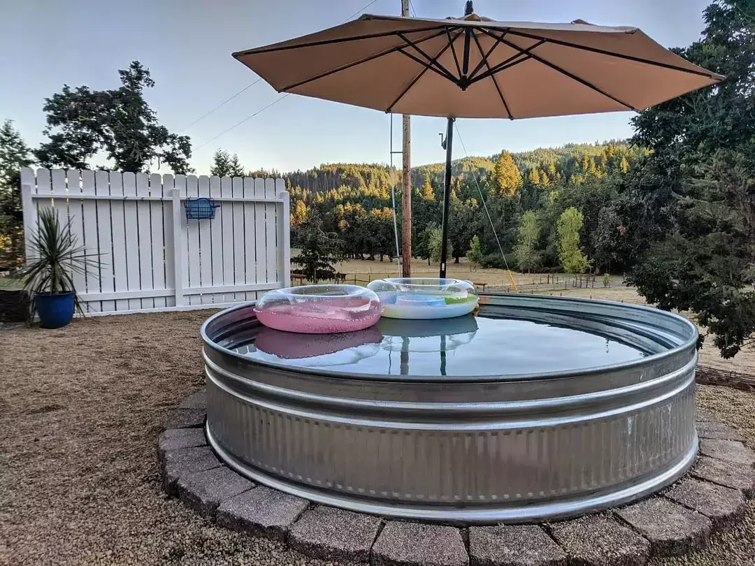 30 Stunning Above-Ground Pool Ideas That'll Transform Your Backyard 26 Elevated Stock Pool