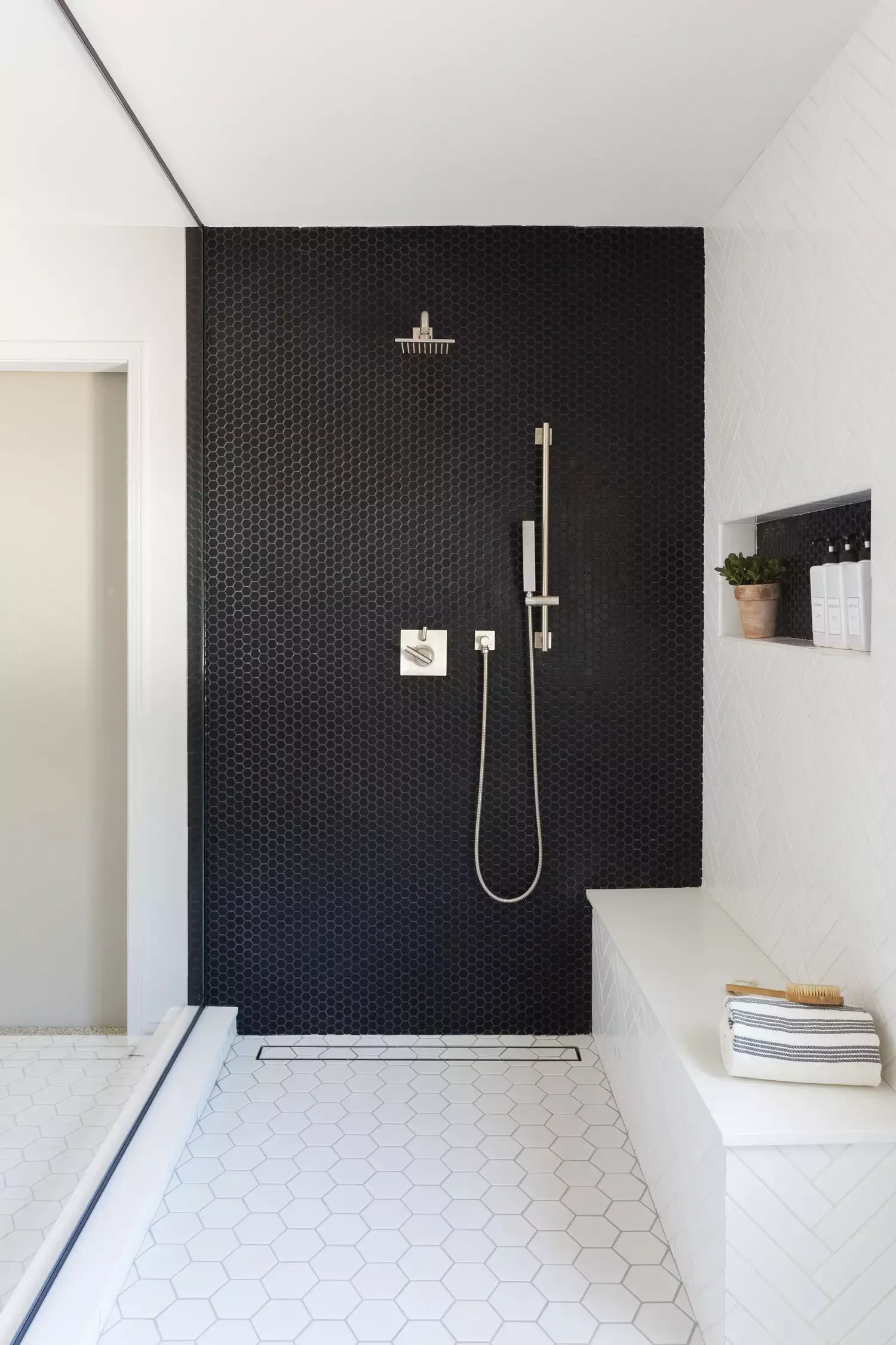 15 Fresh Modern Home Decorating Ideas to Create a Sleek, Streamlined Space This Spring 16 Experiment With Shower Tiles