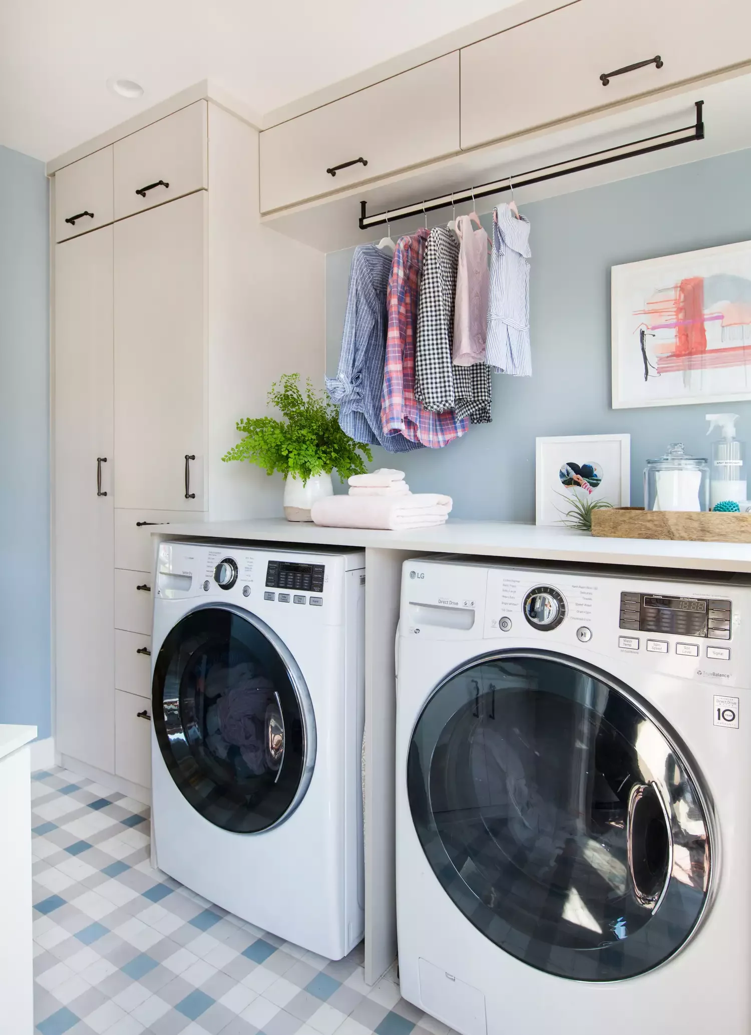 42 Brilliant Laundry Room Organization Solutions to Try This Season Extend Cabinets to the Ceiling