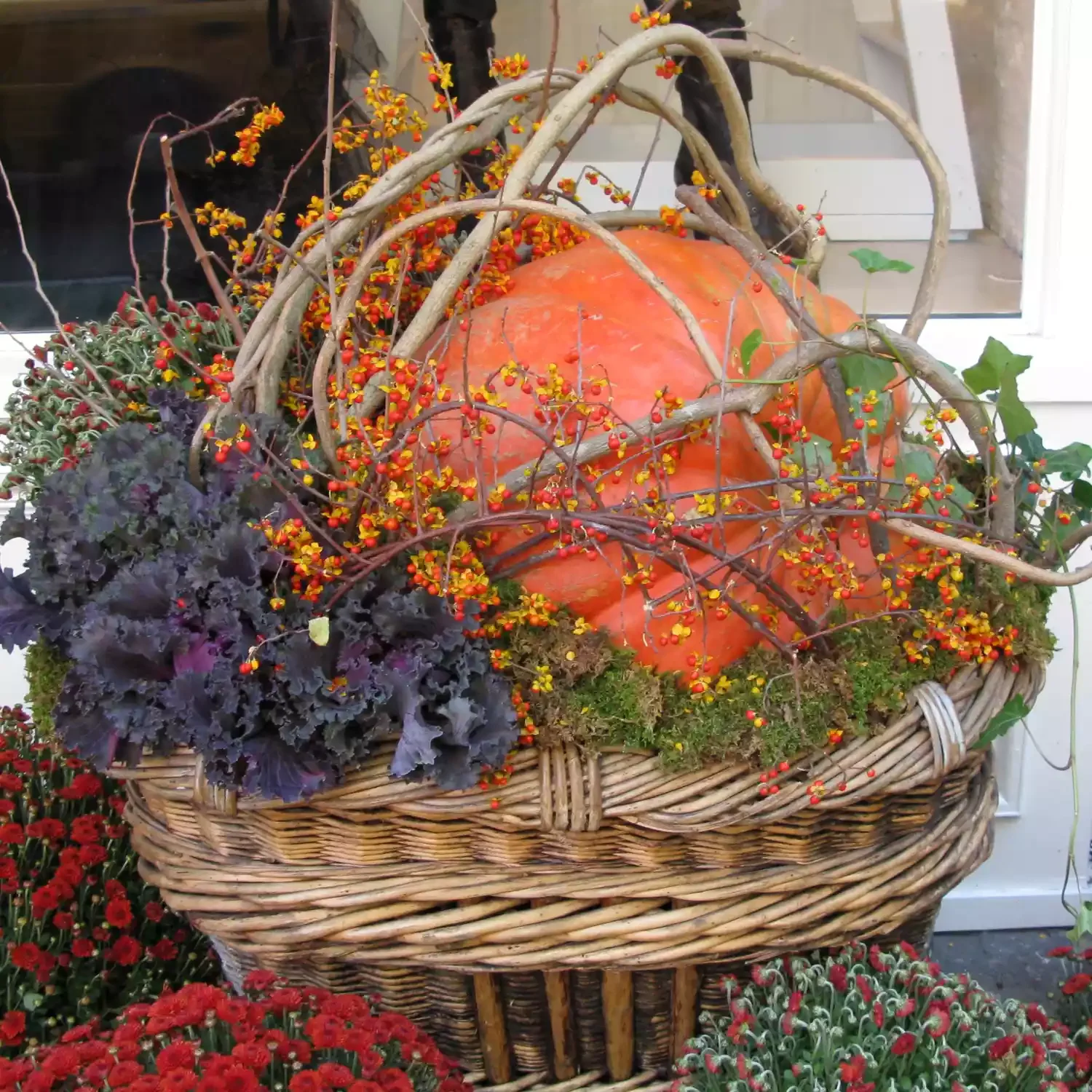 20 Stunning Fall Container Ideas to Transform Your Outdoor Space 7 Fall Container With a Gourd