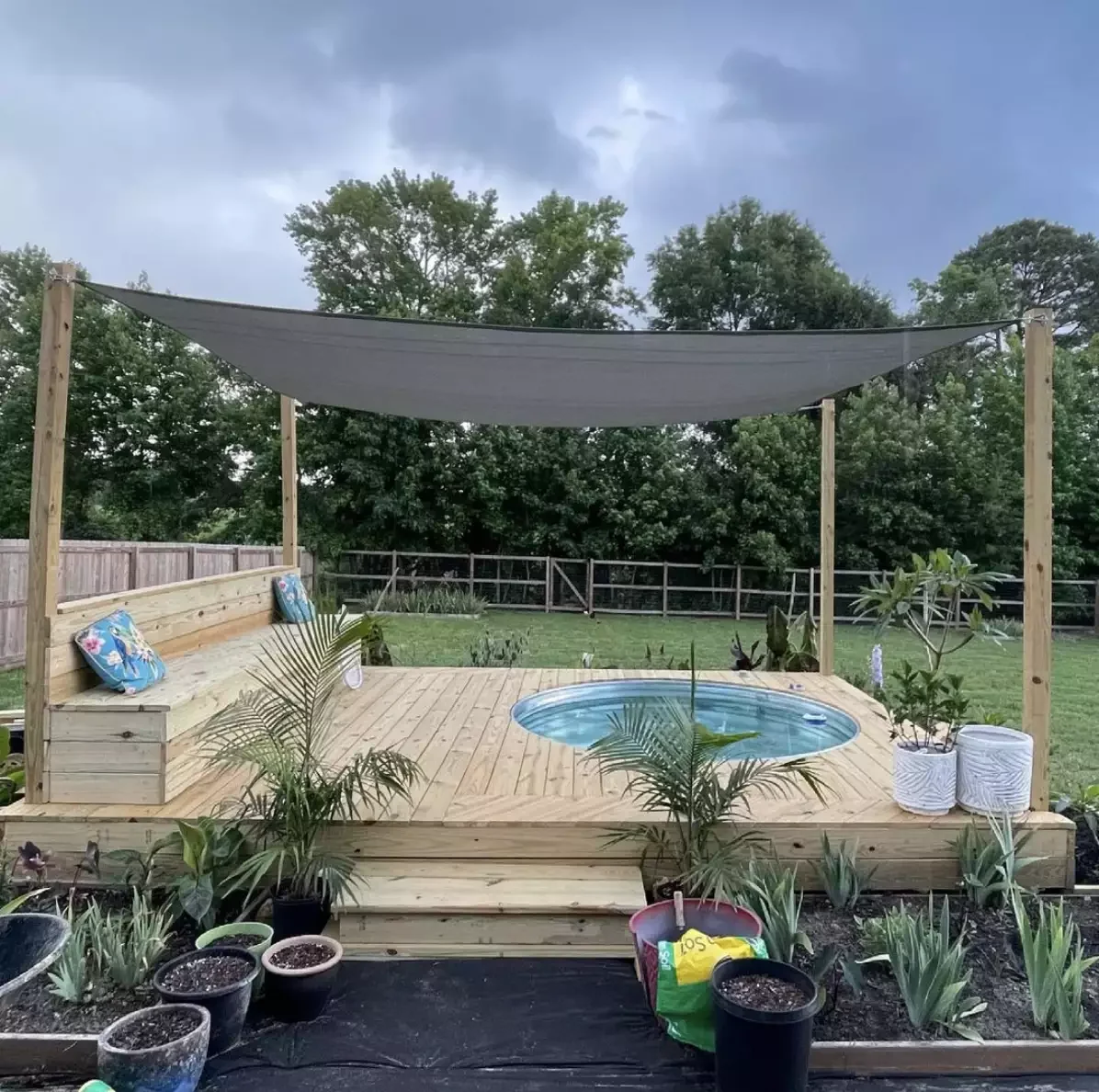 33 Creative Stock Tank Pool Ideas to Transform Your Backyard 15 Feature Privacy and Seating