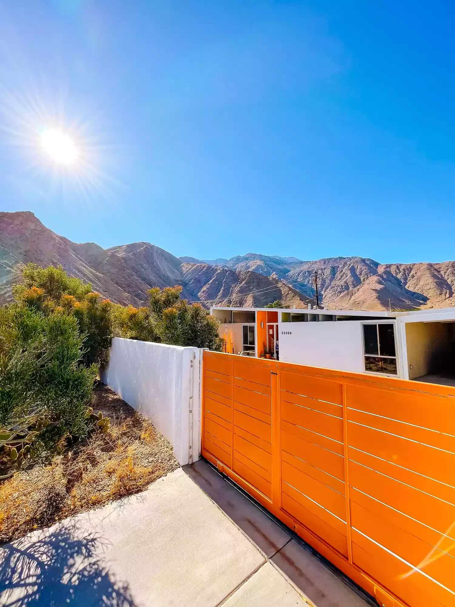 31 Stunning Front Yard Fence Ideas That Will Transform Your Home's Curb Appeal Fence With a Bright Color