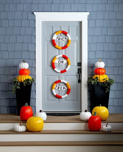 56 Creative DIY Halloween Decorations for Outdoor Spaces 49 Festive Candy Corn Wreath Trio