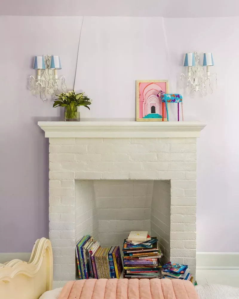 44 Beautiful Fireplace Mantel Styling Ideas 35 Fill the Fireplace with Books