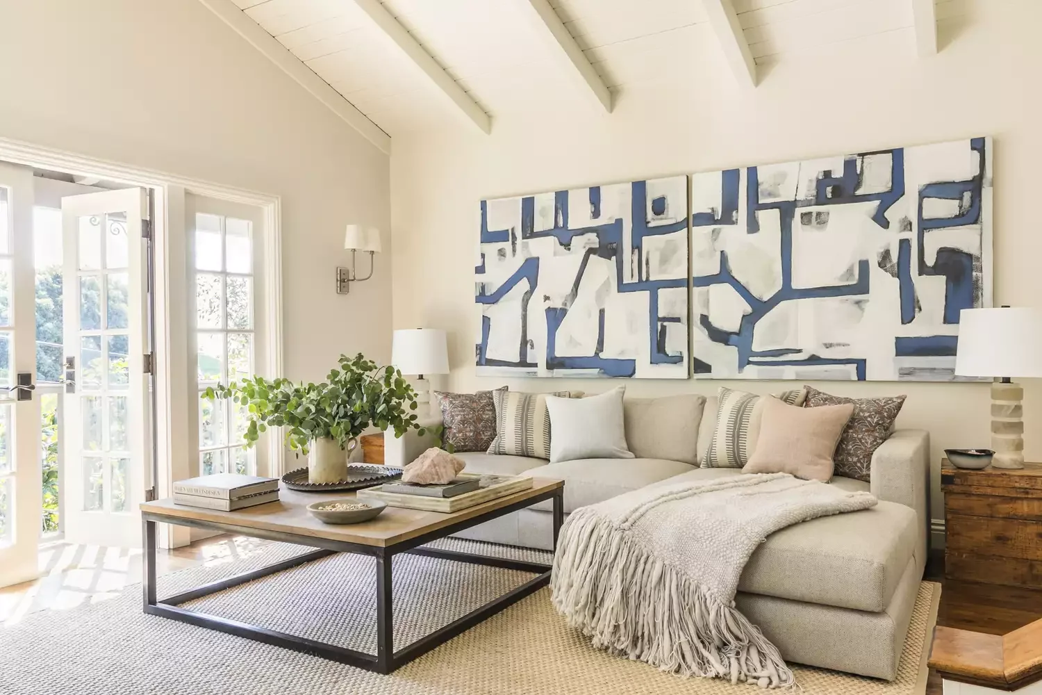 38 Charming Coastal Farmhouse Decorating Ideas to Transform Your Home 27 Find Oversized Abstract Art
