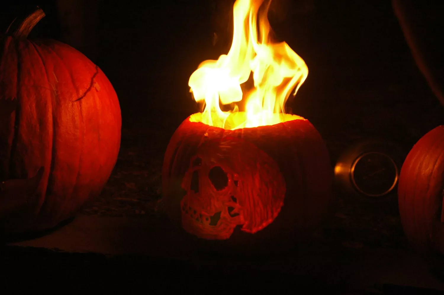 77 Creative Pumpkin Carving Ideas That'll Transform Your Fall Decorating Game 42 Fire Pit Pumpkin