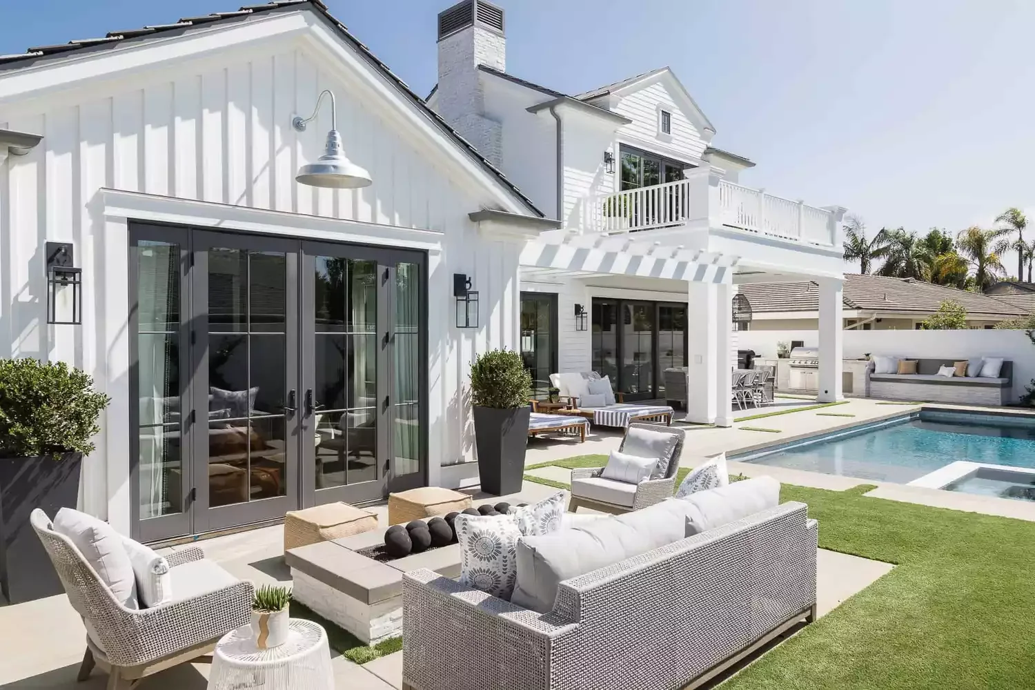 25 Stunning Fire Pit Landscaping Ideas That Transform Your Backyard Into an Entertainment Paradise 11 Fire Pit With Lush Lawn and Topiary Accents
