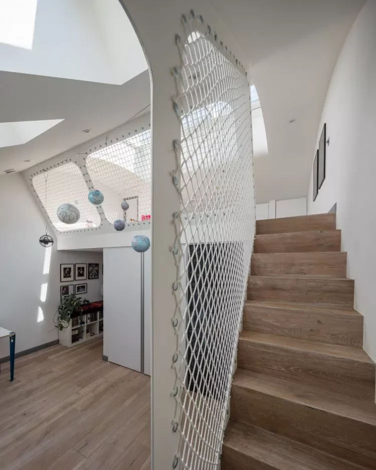 34 Stunning Stair Railing Designs That Transform Your Home 2 Fishnet Stair Railing
