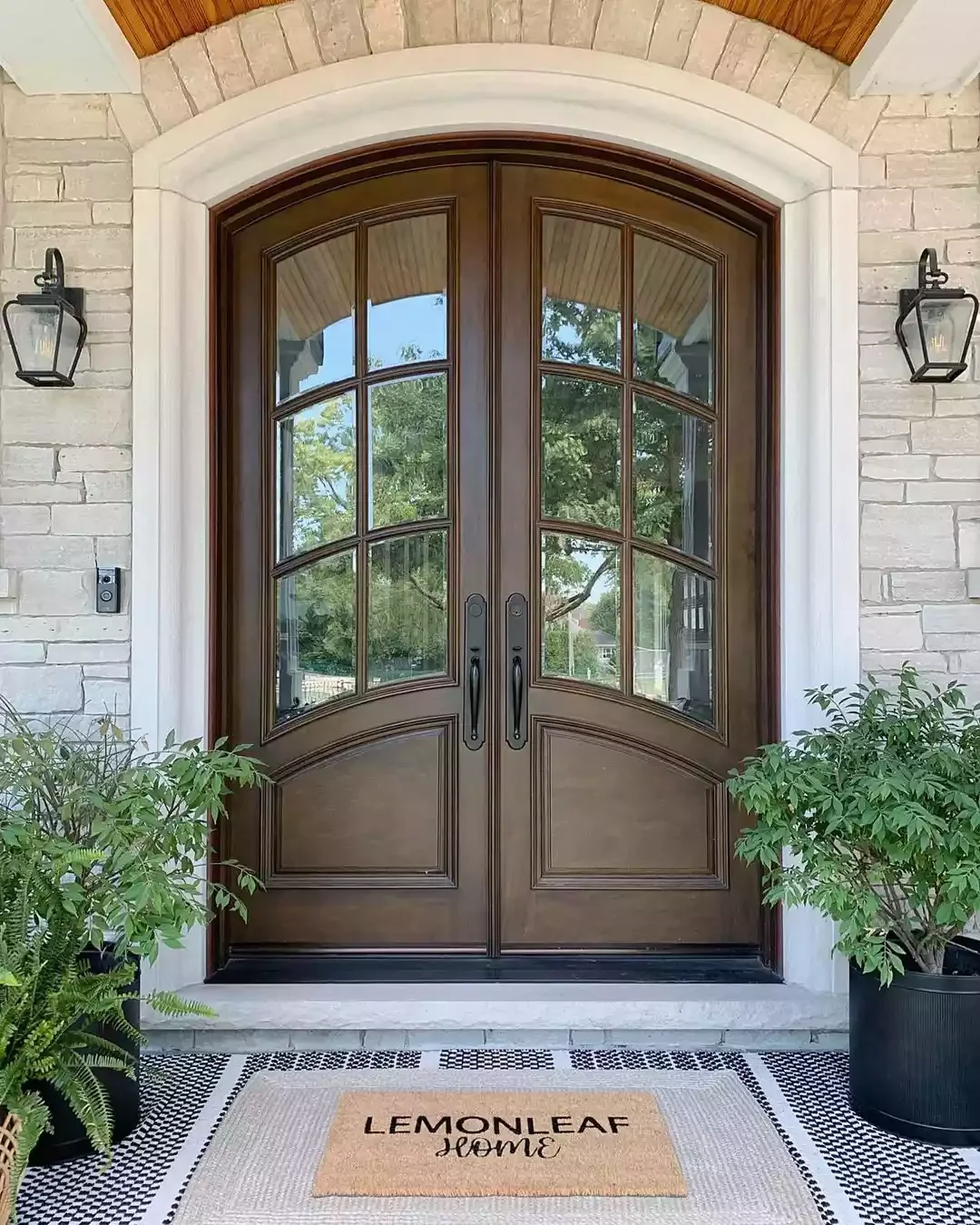25 Stunning Front Porch Lighting Ideas to Transform Your Home's Entrance 3 Flank the Doors