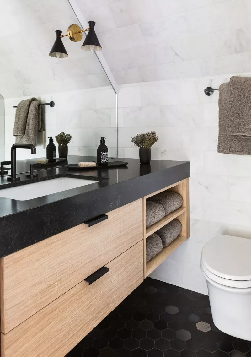 22 Clever Ways to Make Your Narrow Bathroom Feel Spacious and Stylish 12 Float the Vanity