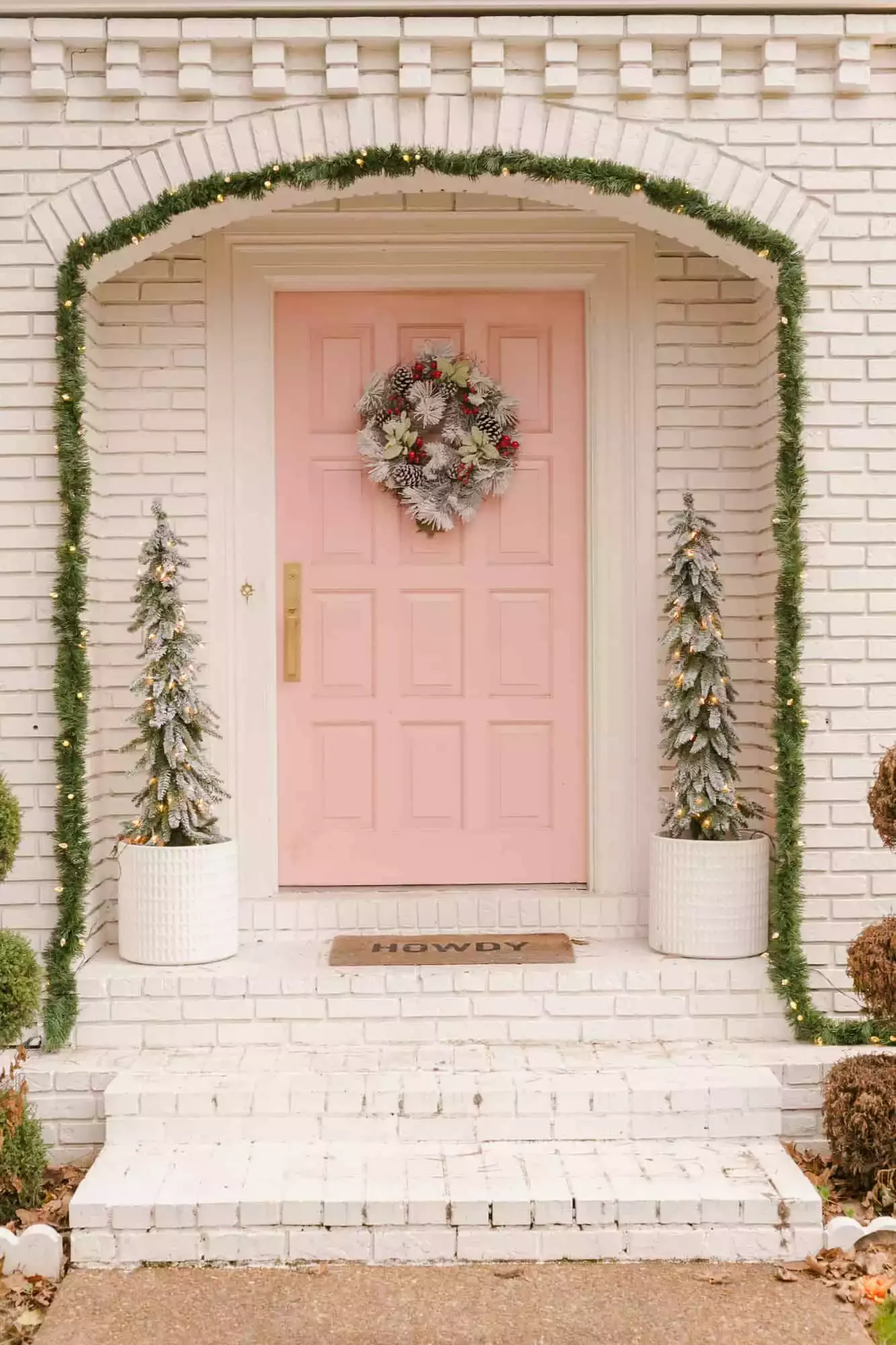 68 Christmas Front Porch Ideas That Make Your Home the Envy Flocked Faux Greens