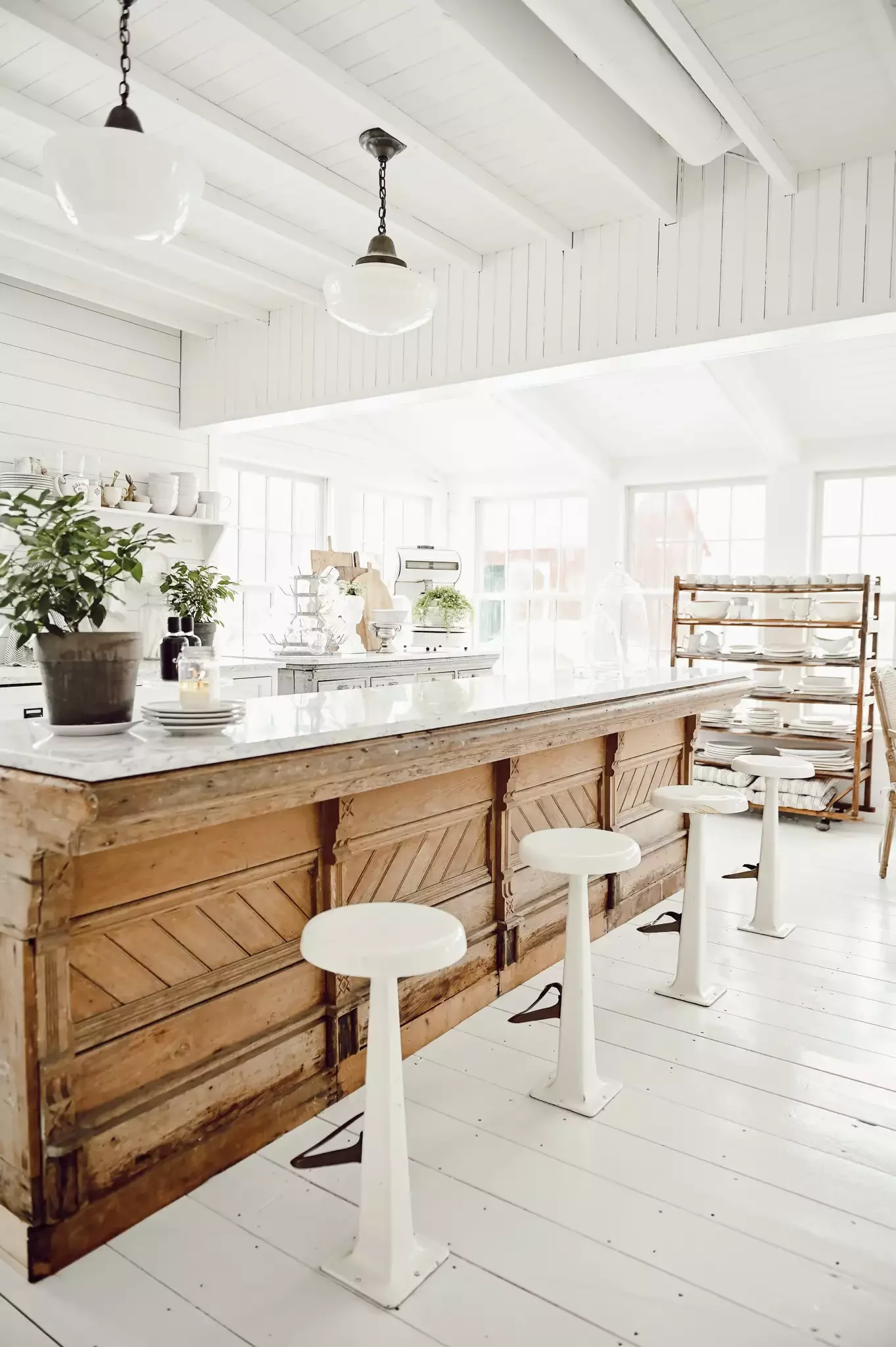 33 Smart Kitchen Island Seating Ideas to Streamline Your Busy Days Floor-Bolted Vintage Stools