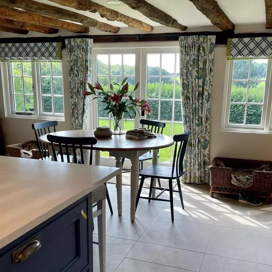 32 Charming Country Kitchen Ideas That'll Make You Never Want to Leave Your Cooking Space 26 Floor Length Floral Curtains