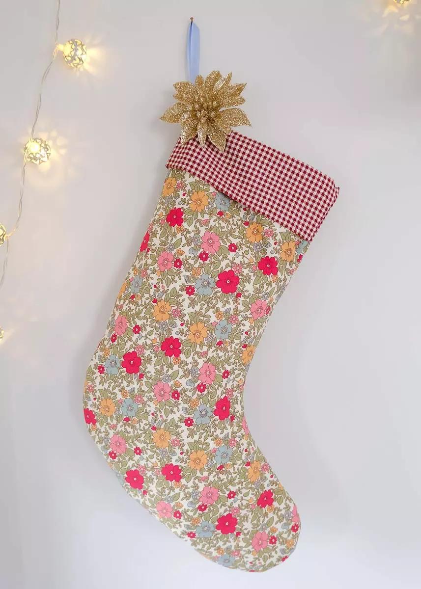 41 Creative DIY Christmas Stocking Ideas That Will Transform Your Holiday Decor 15 Floral Christmas Stockings