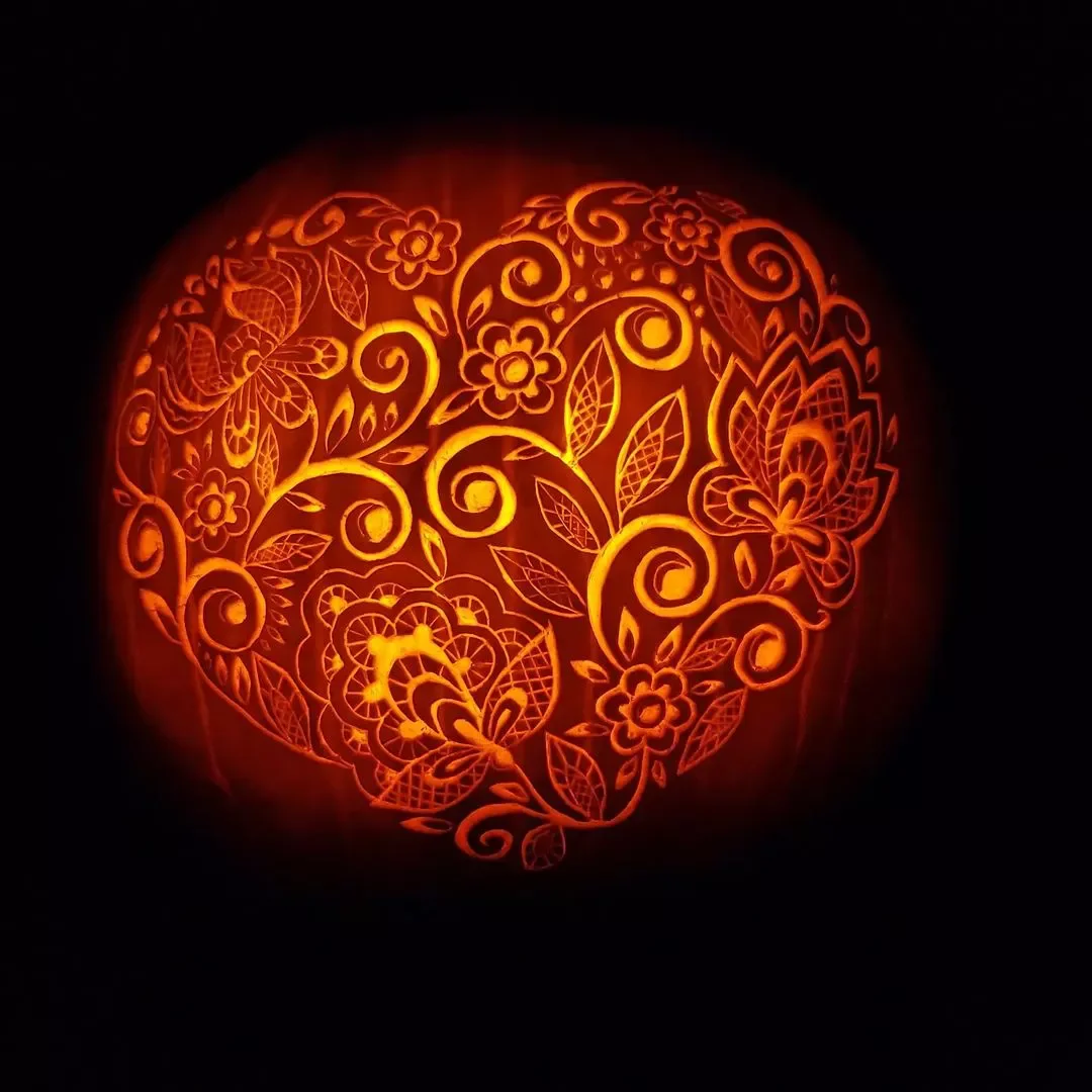 77 Creative Pumpkin Carving Ideas That'll Transform Your Fall Decorating Game 52 Floral Filagree Pumpkin
