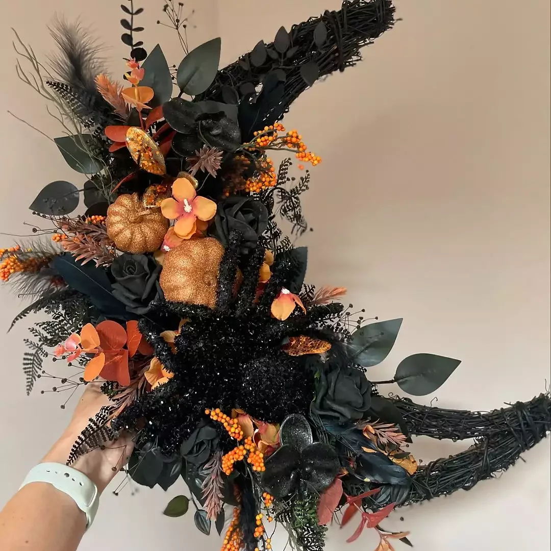 45 Spooktacular Halloween Wreath Ideas That Will Make Your Front Door the Neighborhood's Favorite Stop 11 Floral Halloween Wreath