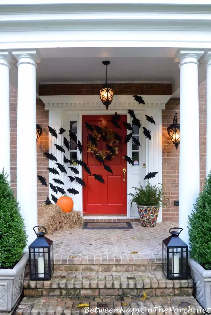 42 Quick Halloween Door Decorations You Can Create in Under an Hour 35 Flying Bats Door Display