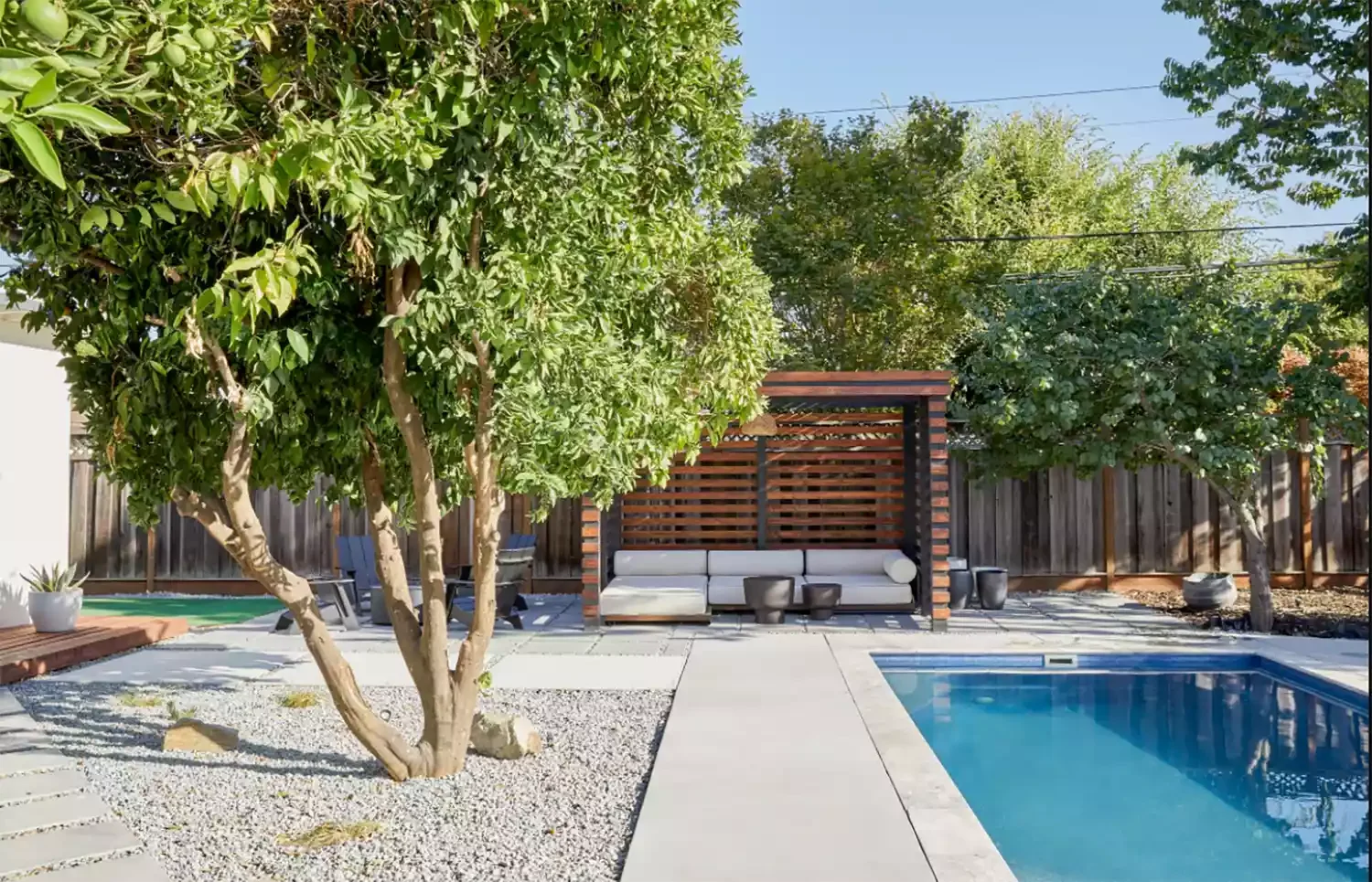 38 Stunning Pool Deck Designs for Your In-Ground and Above-Ground Swimming Pool 3 Forge a Concrete Pathway