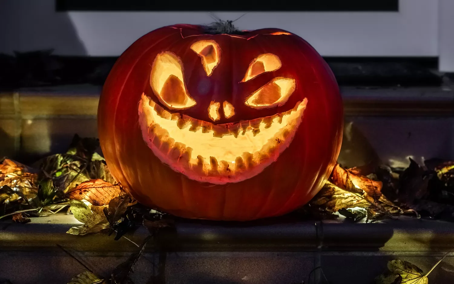 77 Creative Pumpkin Carving Ideas That'll Transform Your Fall Decorating Game 71 Four-Eyed Pumpkin