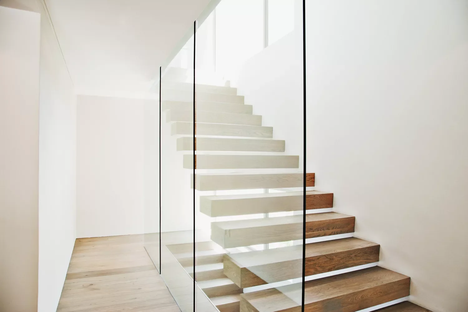 34 Stunning Stair Railing Designs That Transform Your Home 24 Frameless Glass Railing