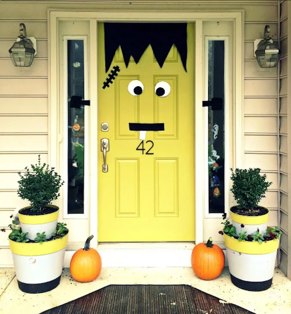 42 Quick Halloween Door Decorations You Can Create in Under an Hour 17 Frankenstein Front Door