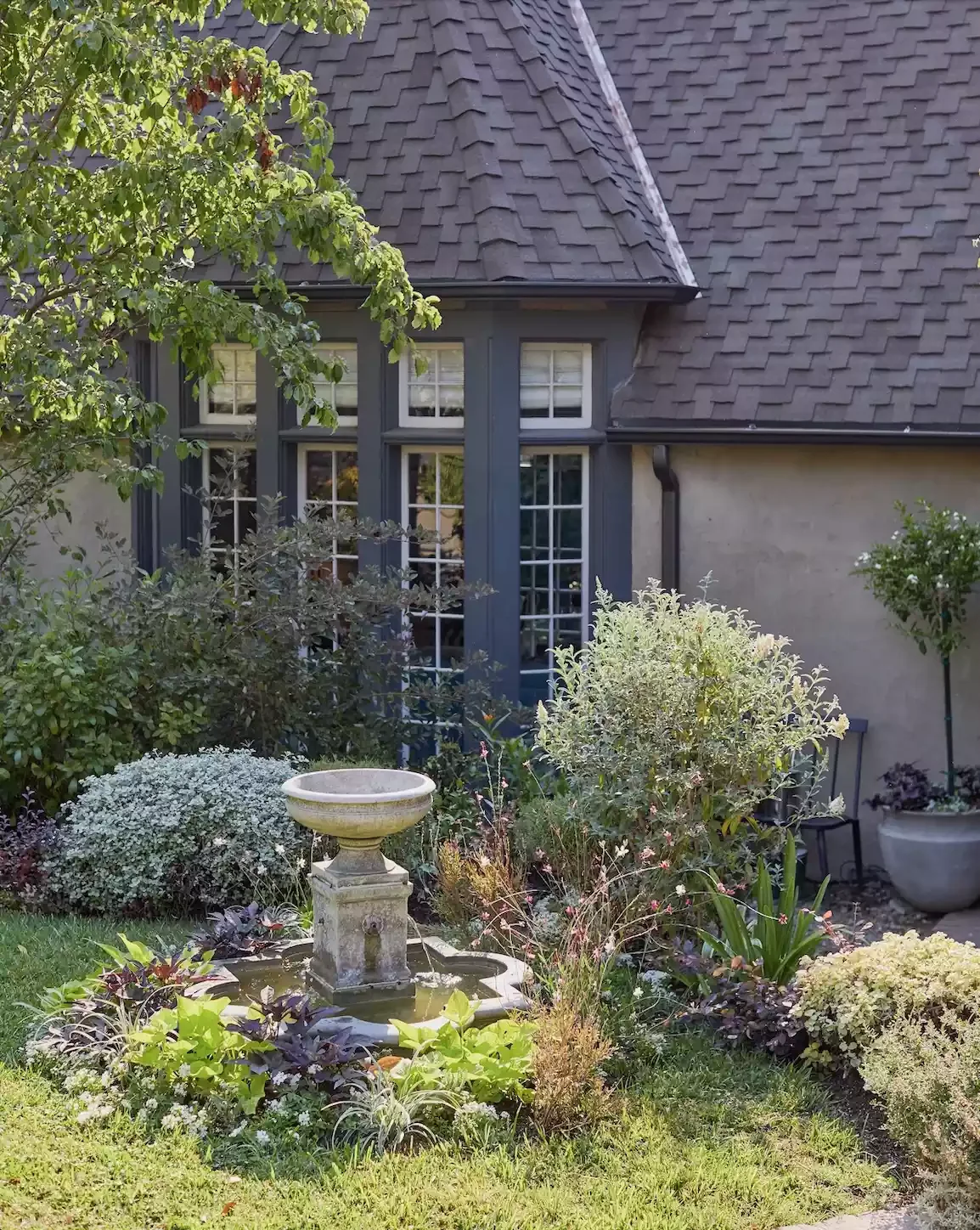 23 Stunning Backyard Water Features That Create Pure Magic French Renaissance-Style Fountain