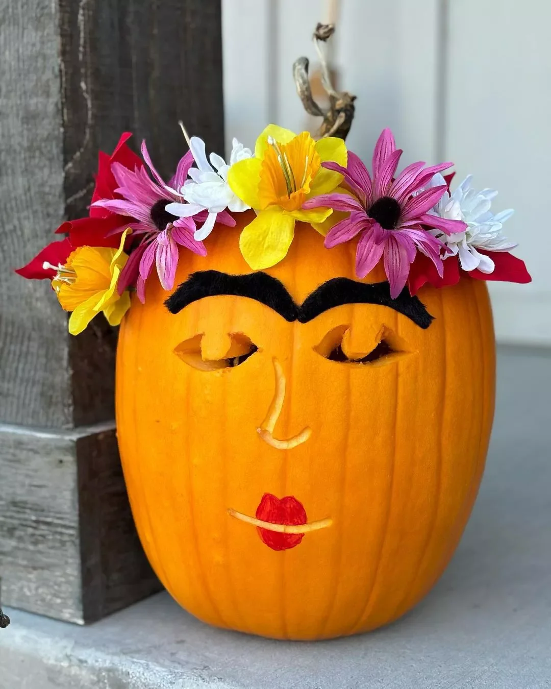 77 Creative Pumpkin Carving Ideas That'll Transform Your Fall Decorating Game 4 Frida Kahlo Pumpkin