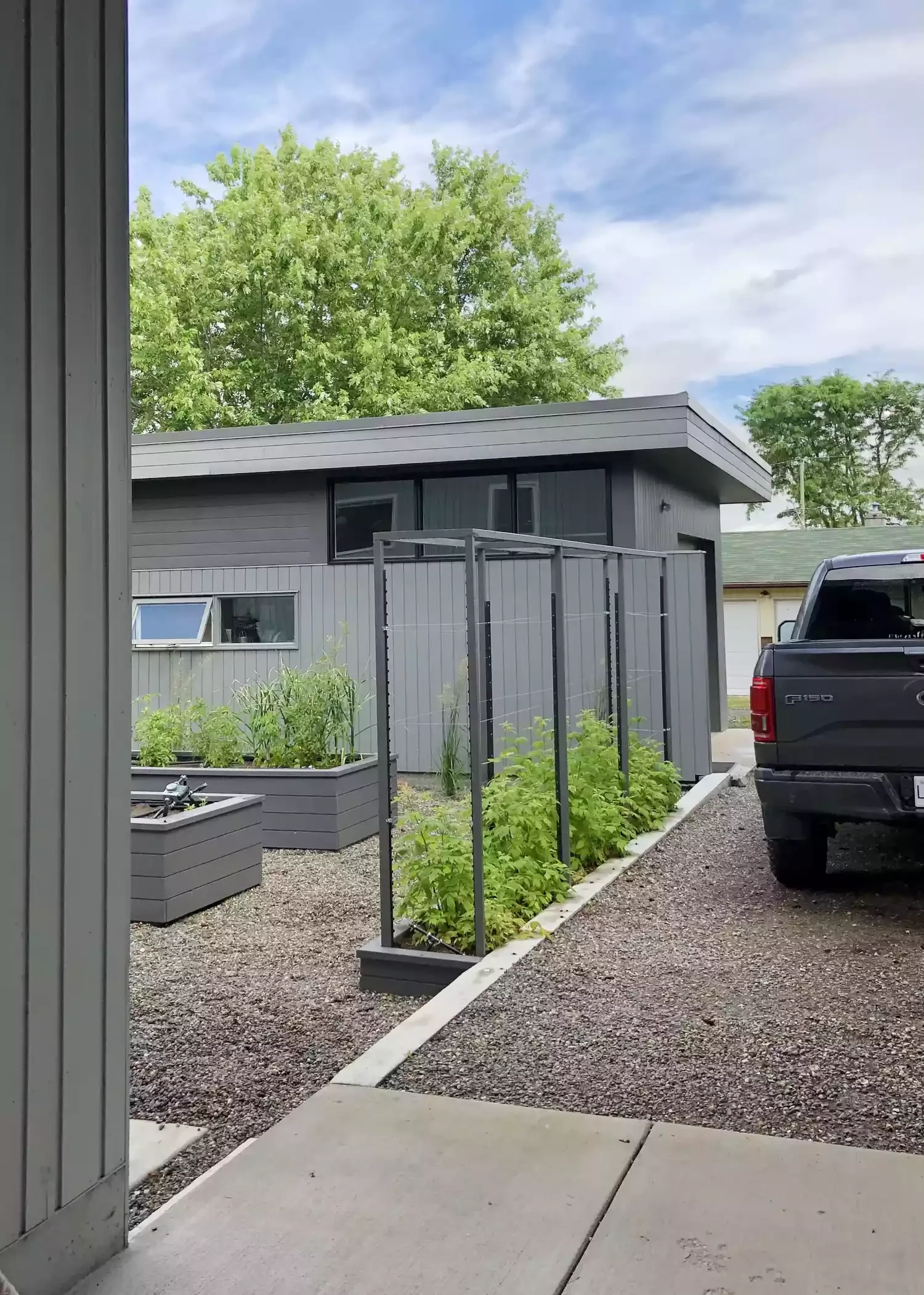 Garden Meets Gravel Driveway