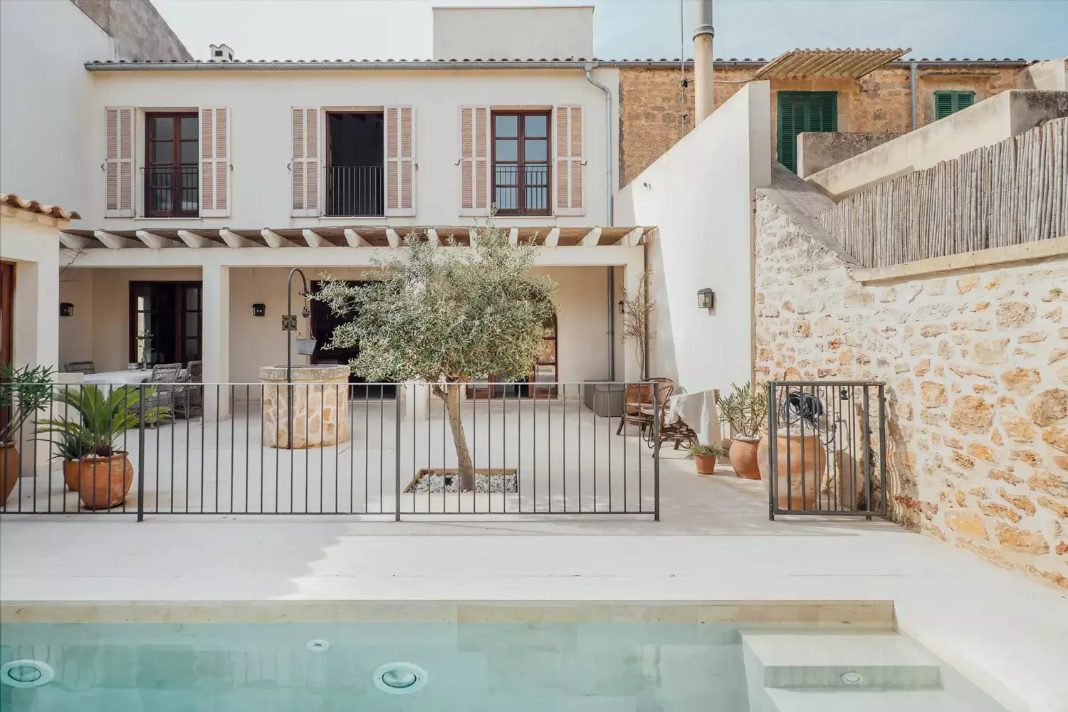 37 Stunning Plunge Pool Designs to Transform Your Backyard Into a Cool Summer Retreat 20 Gated Townhouse Plunge Pool