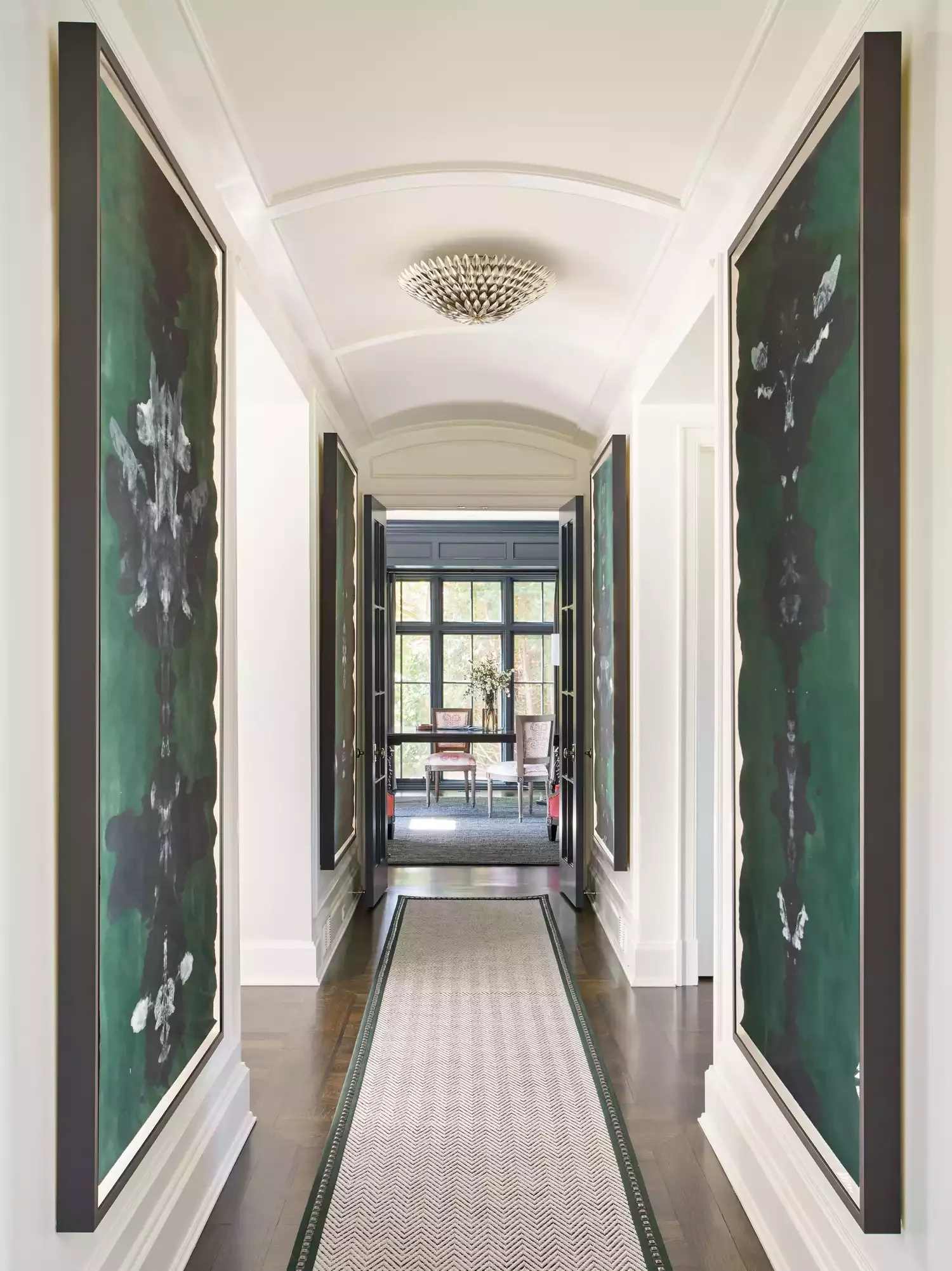 26 Stunning Hallway Decorating Ideas to Transform Your Home's Passageways 4 Get Symmetrical