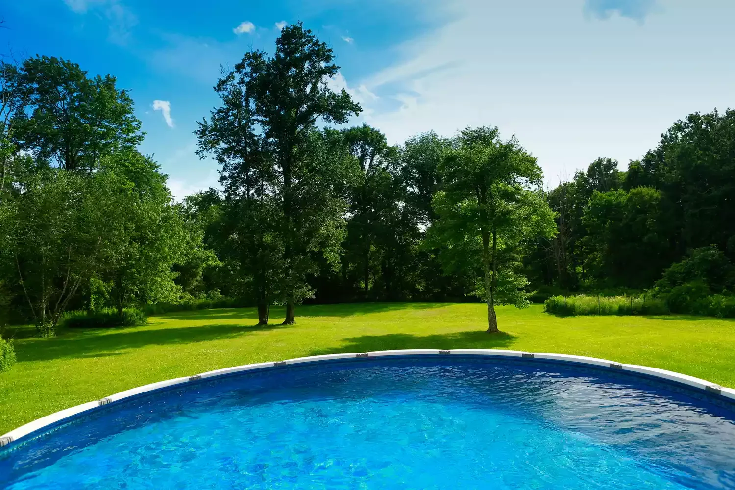37 Brilliant Above-Ground Pool Deck Ideas That Won't Break Your Budget 18 Go All in On Grass